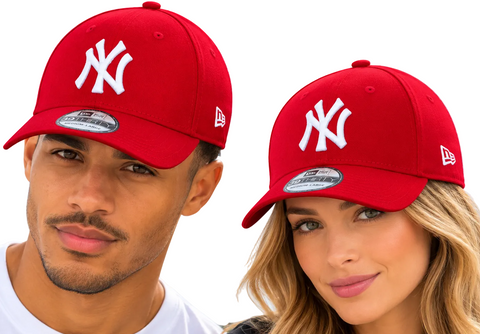 A man and a woman wearing matching red New York Yankees baseball caps with white embroidered logos, photographed against a clean white background.