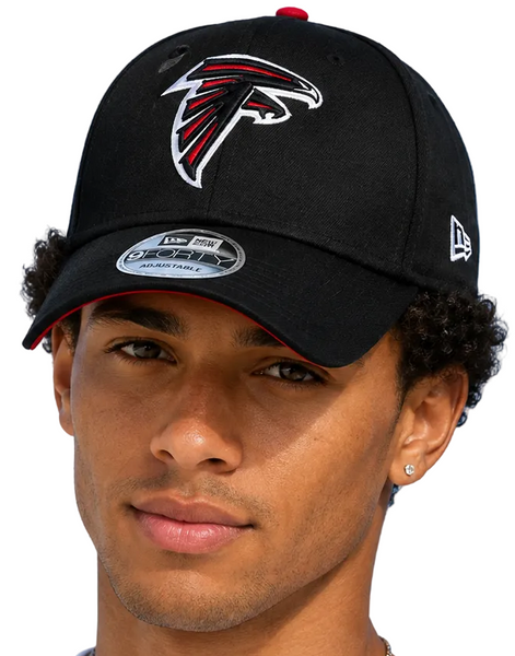 black Atlanta Falcons baseball caps with the New Era logo, set against a clear blue sky.