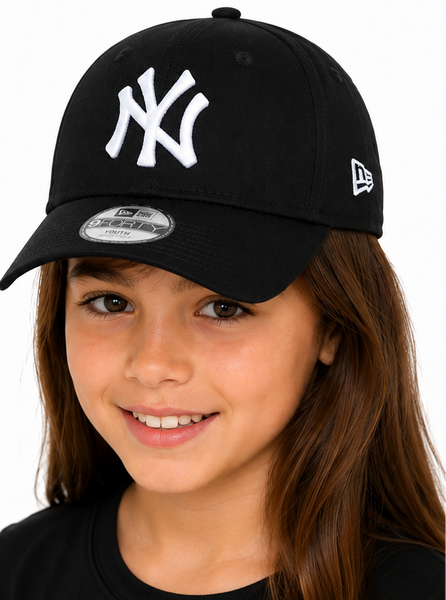 girl wearing black baseball cap