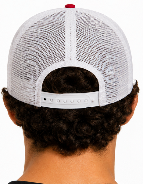 A red and white New York Yankees trucker hat shown on a model from the front and back. The front panel is red with a white embroidered New York Yankees logo, while the back panels are white mesh.